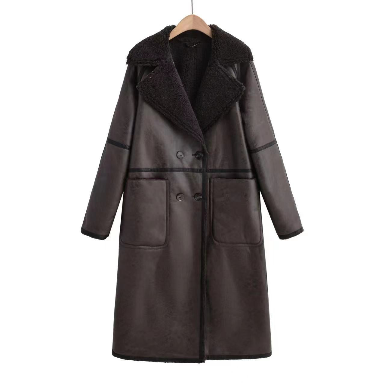 Women’s double-breasted winter trench coat with belt and lapel.