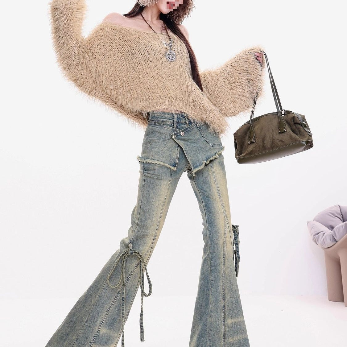 Retro-style distressed party jeans for women with a layered look.
