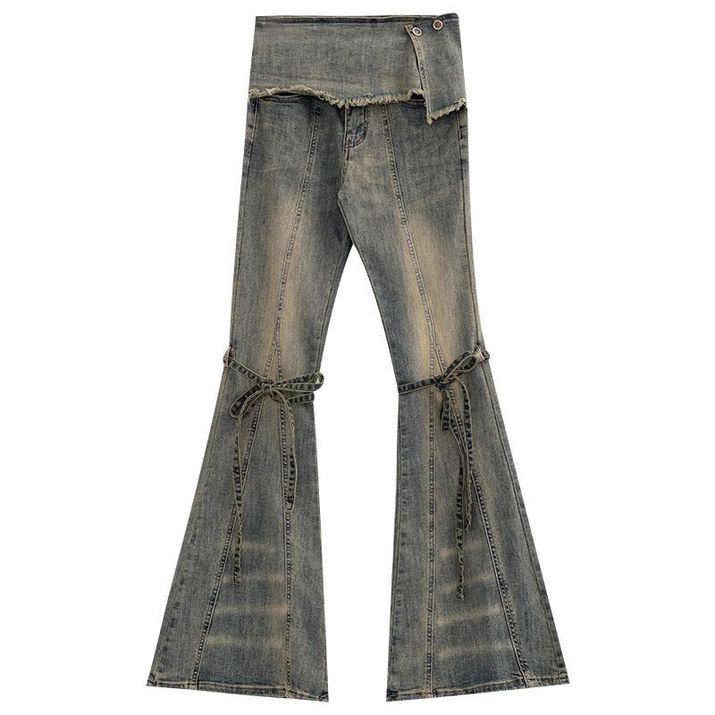 Retro-style distressed party jeans for women with a layered look.