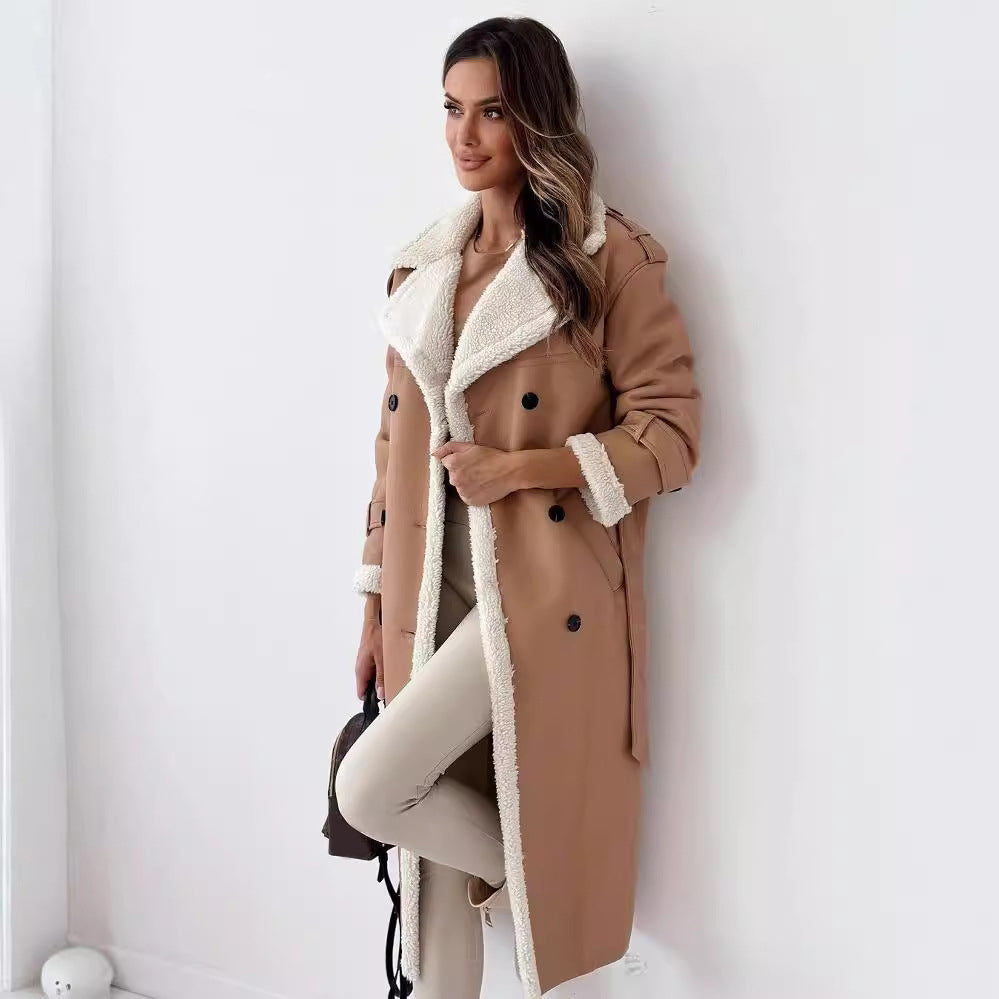 Women’s double-breasted winter trench coat with belt and lapel.